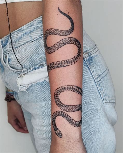 givenchy snake tatoo|snake tattoo around arm.